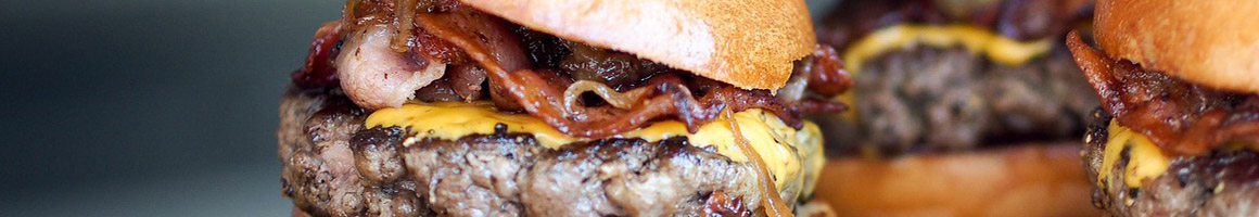 Eating Burger at Miller's Cafe restaurant in Houston, TX.